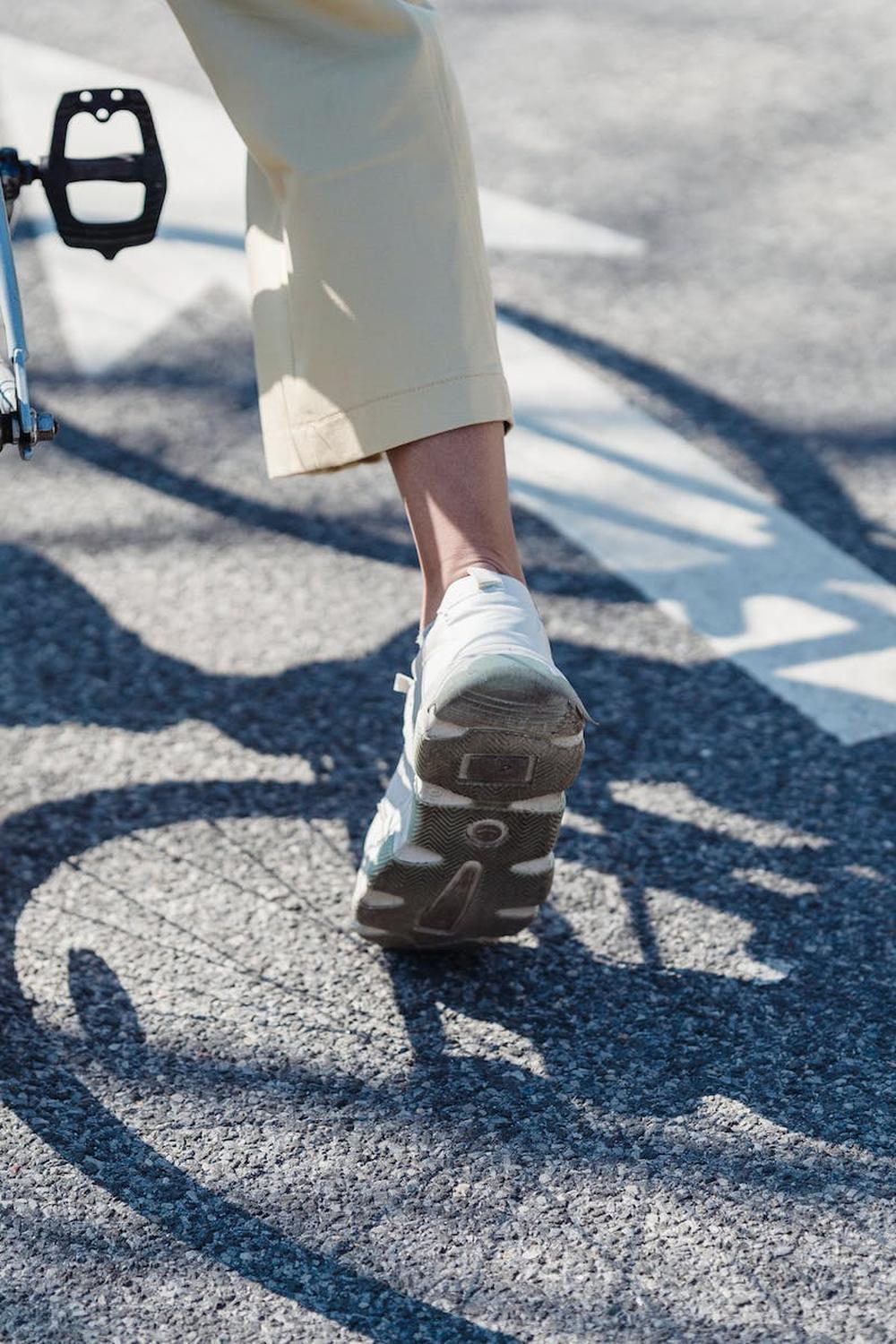 crop_person_riding_bicycle_on_street